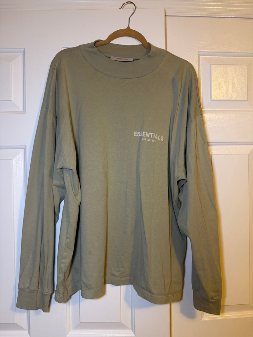 ESSENTIALS Men’s Long-Sleeve Logo Tee in Sage